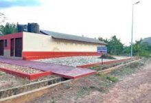 Photo of Two sons of Klefe-Demete hand-over 24-seater toilet facility to community